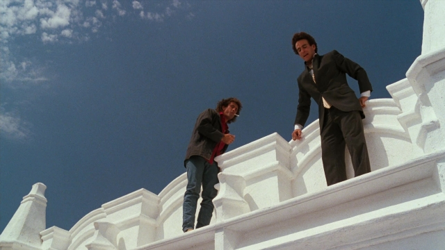 Wide shot frame from Lethal Weapon — standing, suit, person