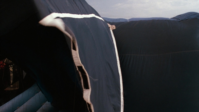 Frame from Lethal Weapon — tent, running