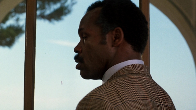 Frame from Lethal Weapon — suit, shirt, mustache