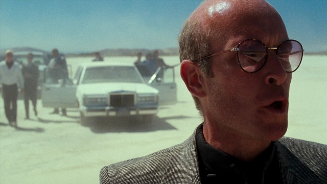 Wide shot frame from Lethal Weapon — standing, walking, dialogue
