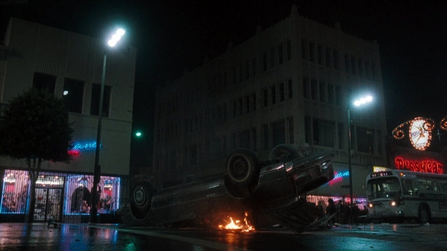 Frame from Lethal Weapon — street, car, night