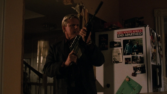 Wide shot frame from Lethal Weapon — book, standing, kitchen
