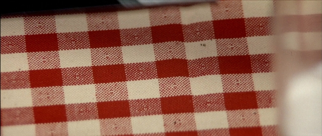 Frame from Léon — uniform, curtain