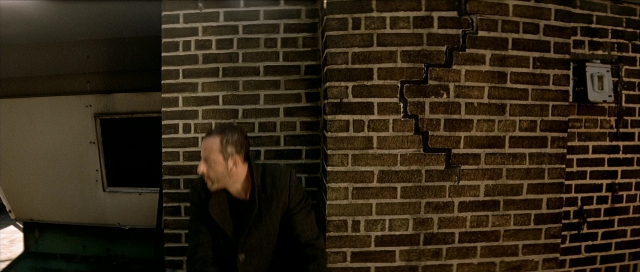 Frame from Léon — standing, person, human face