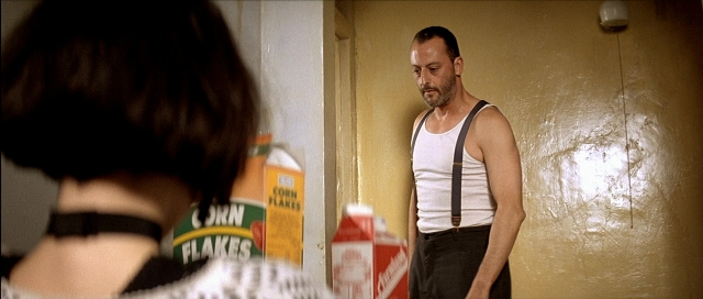 Wide shot frame from Léon — standing, beard, face