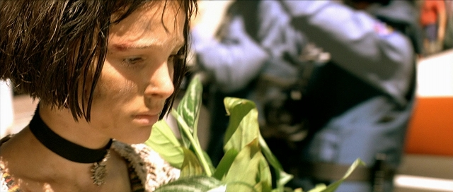 Close-up frame from Léon — face, hair, person