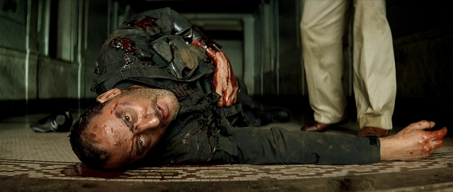 Wide shot frame from Léon — room, shirt, person