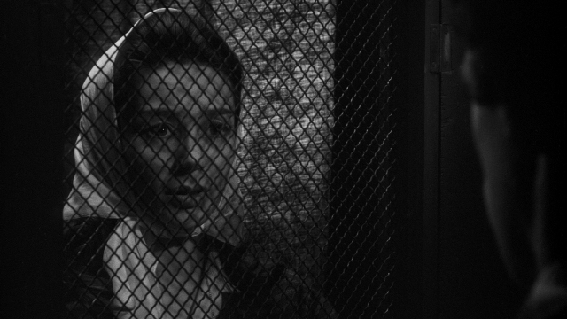 Medium shot frame from Léon Morin, prêtre — face, person, human face