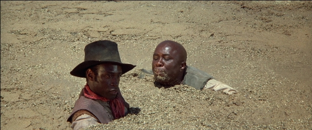 Wide shot frame from Blazing Saddles — hat, face, person