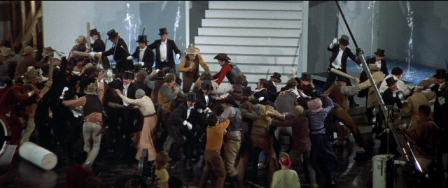 Wide shot frame from Blazing Saddles — room, person, window