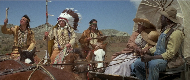 Wide shot frame from Blazing Saddles — sitting, horse, person