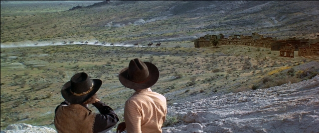Frame from Blazing Saddles — standing, hat, person