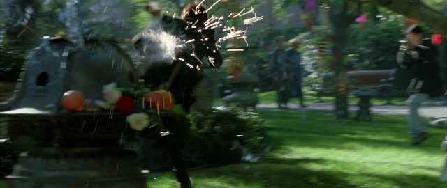 Wide shot frame from Blade — bird, person