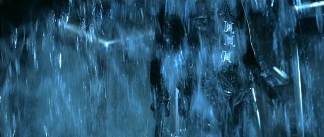 Wide shot frame from Blade — standing, water, fountain