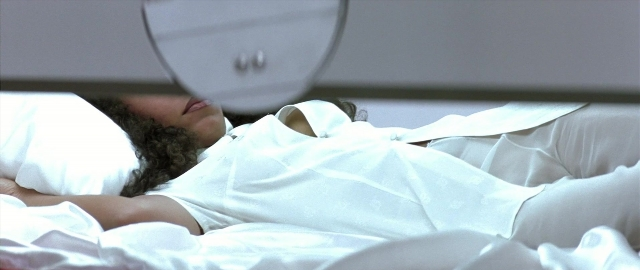 Frame from Blade — room, bed, person