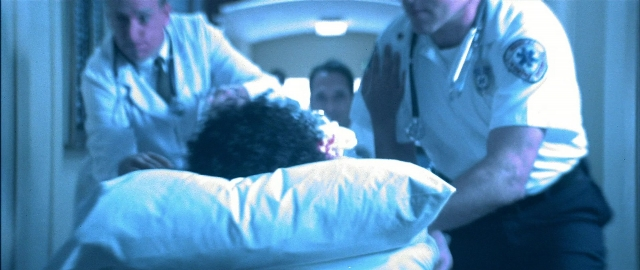 Frame from Blade — standing, room, bed