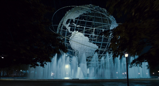 Wide shot frame from Men in Black 3 — night, water, fountain