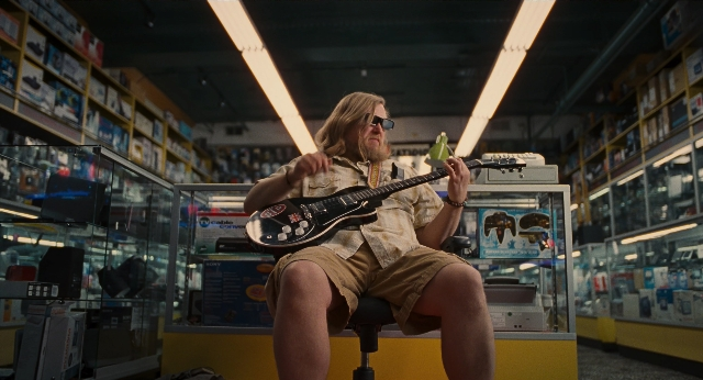 Wide shot frame from Men in Black 3 — people, sitting, action