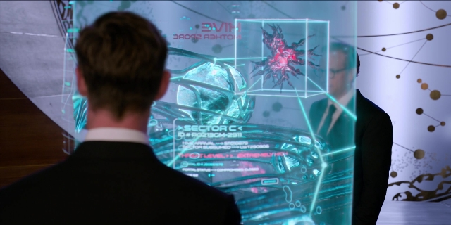 Wide shot frame from Men in Black International — standing, person, human face