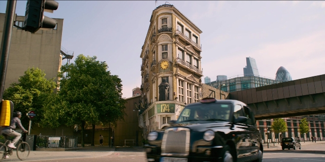 Wide shot frame from Men in Black International — plate, street, car