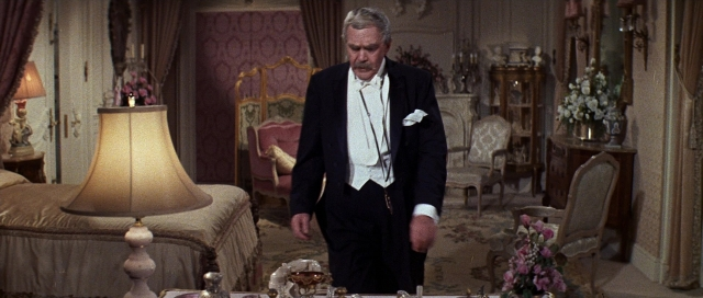 Wide shot frame from Pocketful of Miracles — walking, room, table