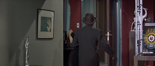 Wide shot frame from Pocketful of Miracles — walking, table, door