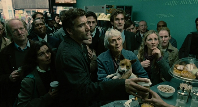 Wide shot frame from Children of Men — sitting, plate, table