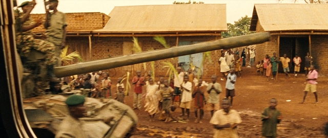 Wide shot frame from The Last King of Scotland — standing, cannon, person