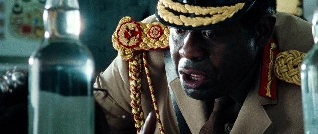 Wide shot frame from The Last King of Scotland — room, hat, uniform