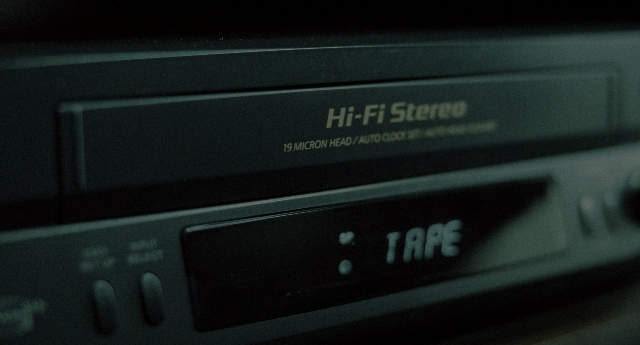 Frame from The Ring — clock, home appliance