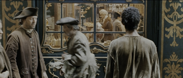 Wide shot frame from Perfume: The Story of a Murderer — book, standing, room