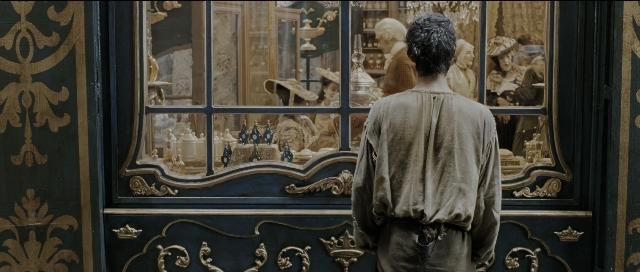 Wide shot frame from Perfume: The Story of a Murderer — standing, shirt, glass