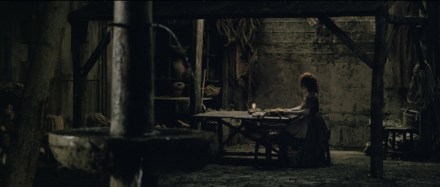 Wide shot frame from Perfume: The Story of a Murderer — sitting, room, table