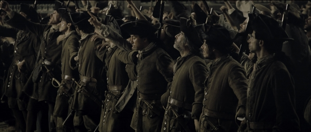 Wide shot frame from Perfume: The Story of a Murderer — standing, person, human face