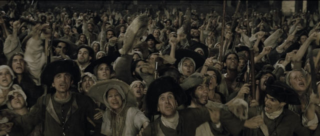 Wide shot frame from Perfume: The Story of a Murderer — room, person, human face