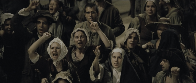 Wide shot frame from Perfume: The Story of a Murderer — standing, person, human face