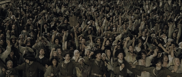 Wide shot frame from Perfume: The Story of a Murderer — standing, room, person