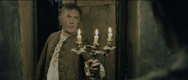Wide shot frame from Perfume: The Story of a Murderer — standing, room, door