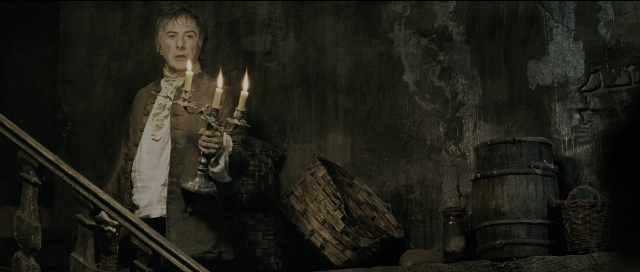 Wide shot frame from Perfume: The Story of a Murderer — standing, room, coat