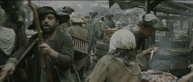 Wide shot frame from Perfume: The Story of a Murderer — standing, dialogue, shirt