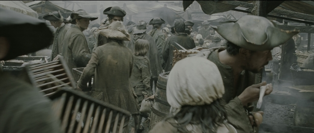 Wide shot frame from Perfume: The Story of a Murderer — standing, dialogue, smoke