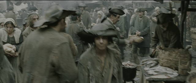 Wide shot frame from Perfume: The Story of a Murderer — walking, smoke, person