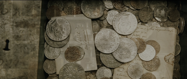 Wide shot frame from Perfume: The Story of a Murderer — coin