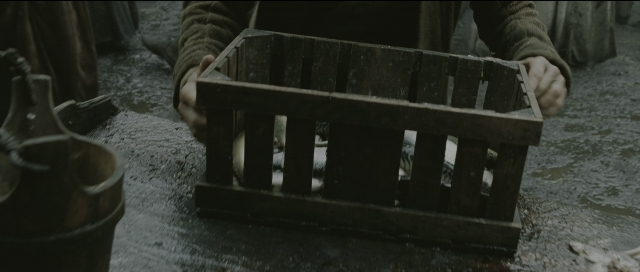 Wide shot frame from Perfume: The Story of a Murderer — standing, shirt, person