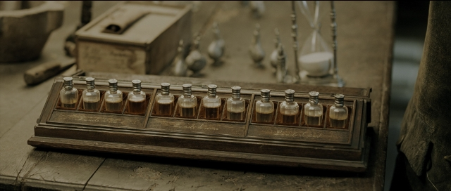Wide shot frame from Perfume: The Story of a Murderer — glass, box