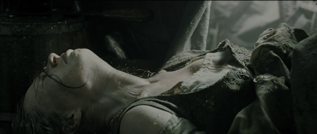 Wide shot frame from Perfume: The Story of a Murderer — smoke, person, human face