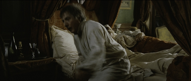 Wide shot frame from Perfume: The Story of a Murderer — sitting, room, table