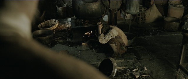Wide shot frame from Perfume: The Story of a Murderer — sitting, room, kitchen