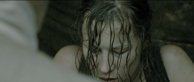 Wide shot frame from Perfume: The Story of a Murderer — water, face, hair