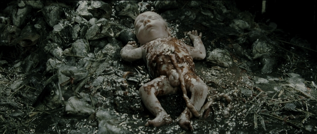 Wide shot frame from Perfume: The Story of a Murderer — bed, person, human face